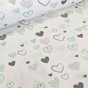 Бавовняна тканина польська серця м'ятні, сірі з точками та смужками на білому
