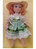 Порцелянова лялька у святковому платті