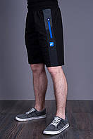 Чоловічі трикотажні шорти Nike, темно-синього кольору.