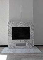 Готовий камін оброблений мармуром "Royal white"