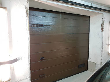 Автоматические гаражные подъемные ворота в паркинг