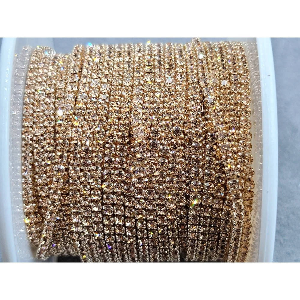 

Стразовая цепочка плотная, цвет персиковый, оправа под цвет страз ss4 (1.5 mm) 1м.