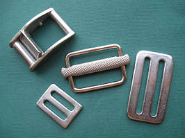 ремені та комплектуючі для строп та ременів : пряжки, гаки, карабіни