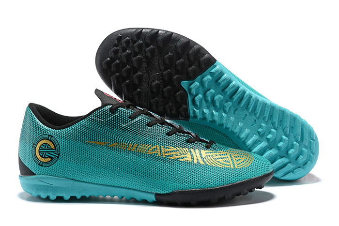 Футбольні стоноги Nike Mercurial VaporX XII Academy Ronaldo TF Clear Jade/Metallic Vivid Gold/Black