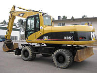 Колесный экскаватор Caterpillar M322С.