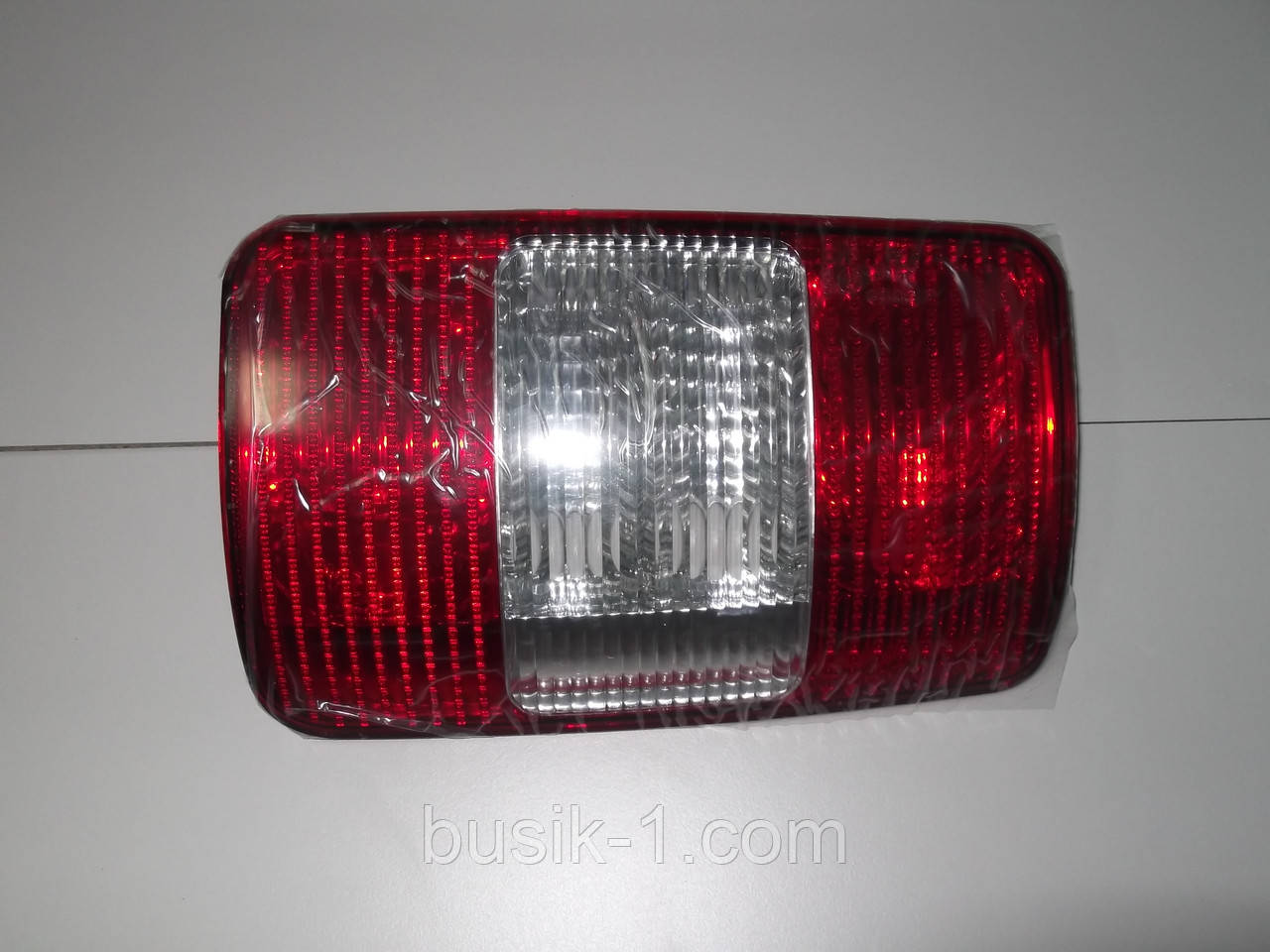 Ліхтар задній Caddy 04-10г.в. 1\2 дверки