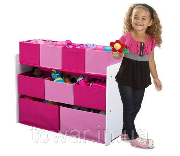 Рожевий органайзер для іграшок, полиця з ящиками.