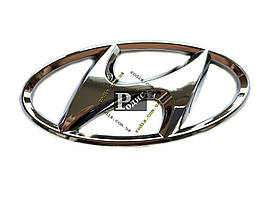 Емблема Hyundai на двосторонній скотчі (l — 145 мм, b — 70 мм, s (товщина) — 10 мм)