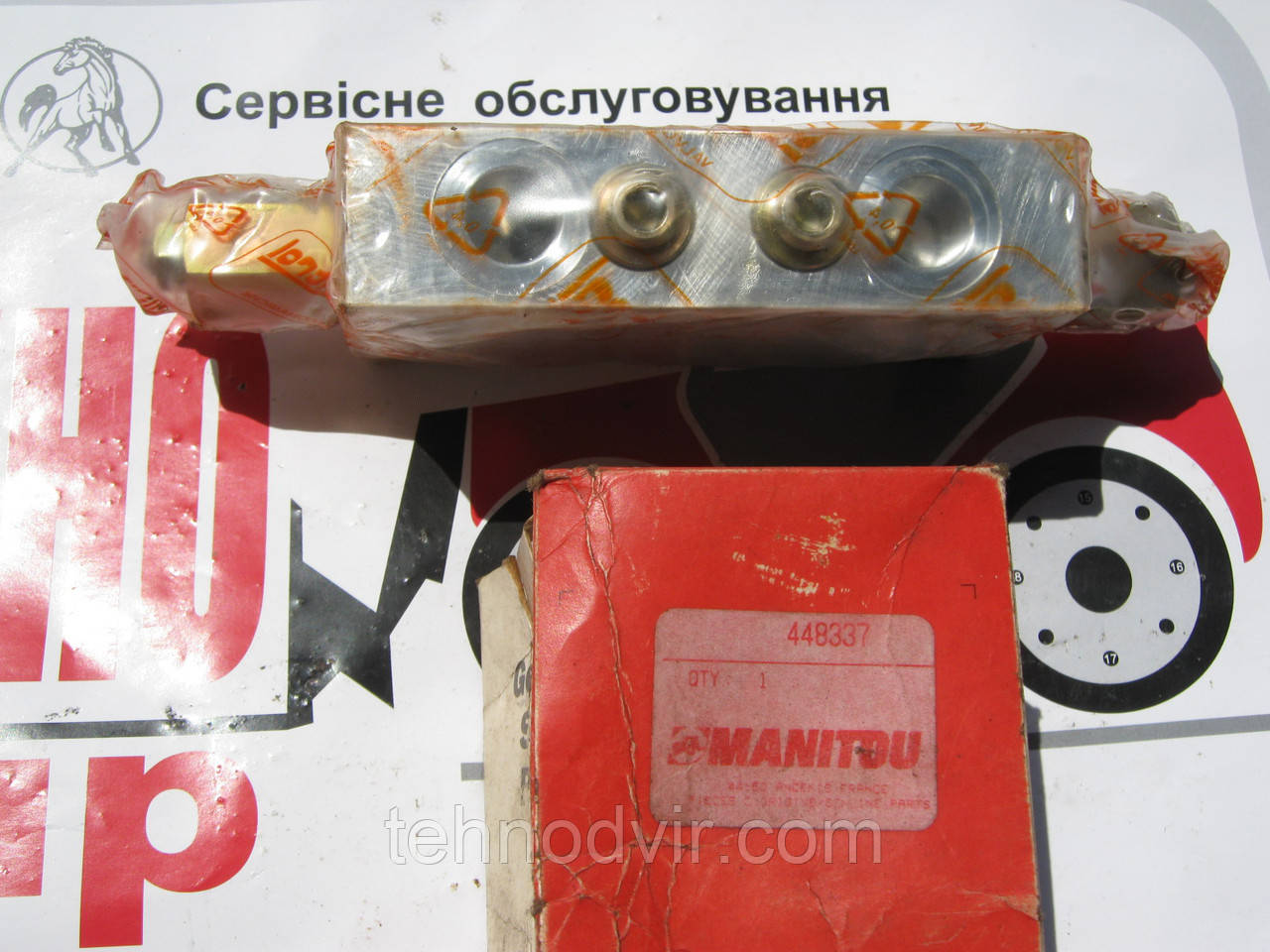 448337 - Клапан . Manitou