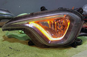 Hyundai Grand Santa Fe - установка ДХО с функцией поворота в ПТФ  2