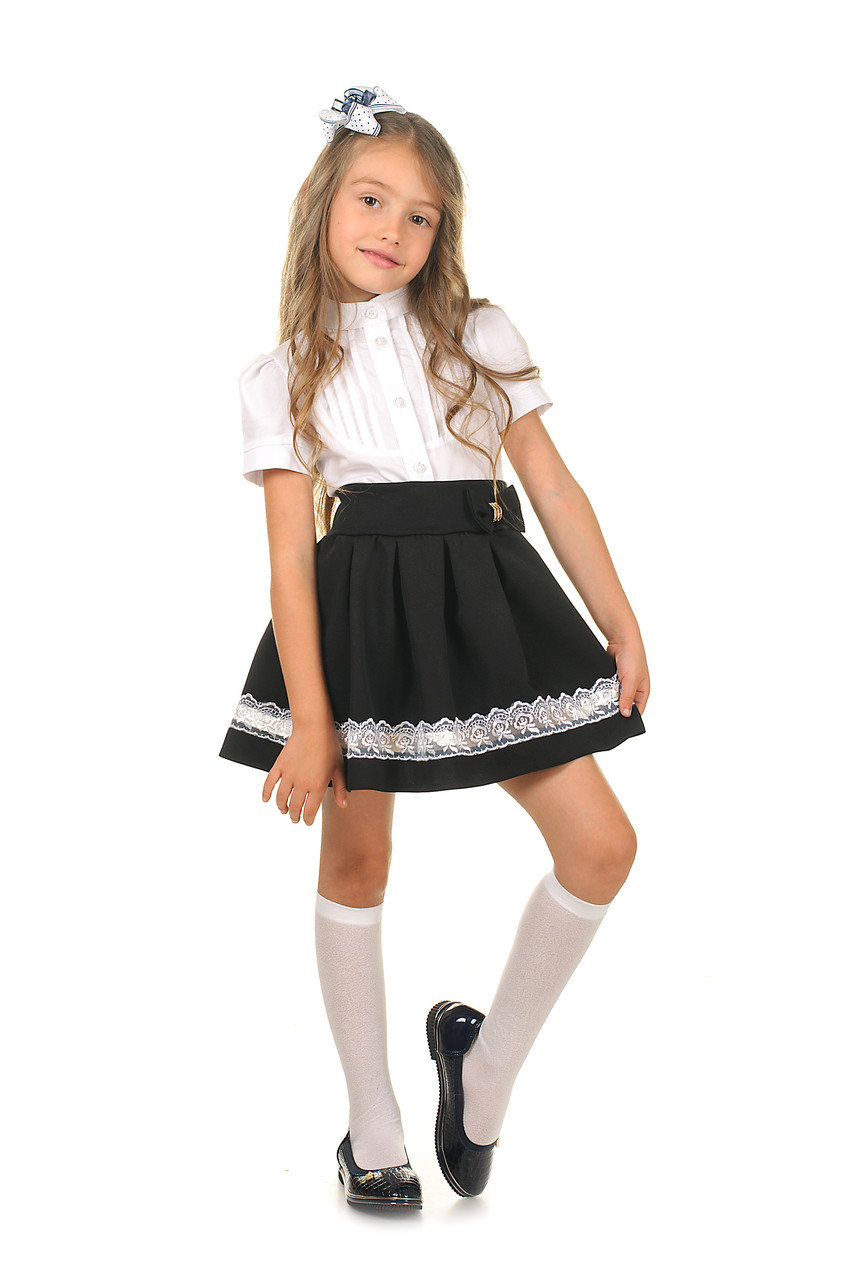 Модна шкільна спідниця для дівчинки в чорному кольорі