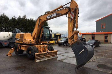 Колісний екскаватор CASE WX165.
