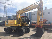 Колесный экскаватор Komatsu PW200.