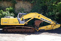 Гусеничный экскаватор New Holland Kobelco E215B LC.