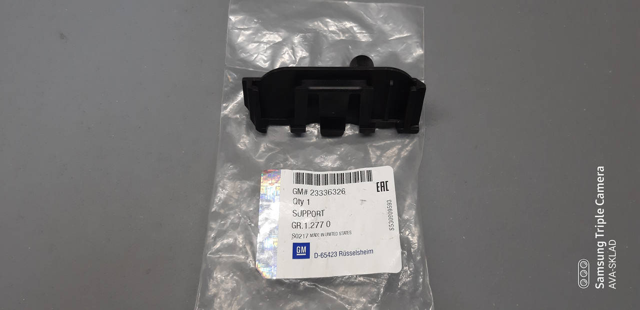 

Крепление радиатора оригинал GM 23336326