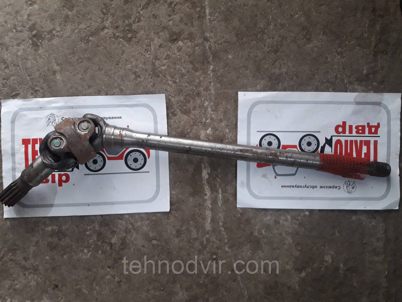 563212 - піввісь . Manitou