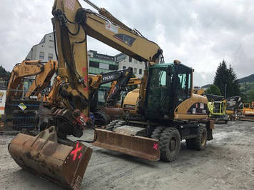 Колісний екскаватор CATERPILLAR M318D.