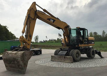 Колісний екскаватор CATERPILLAR M322С.