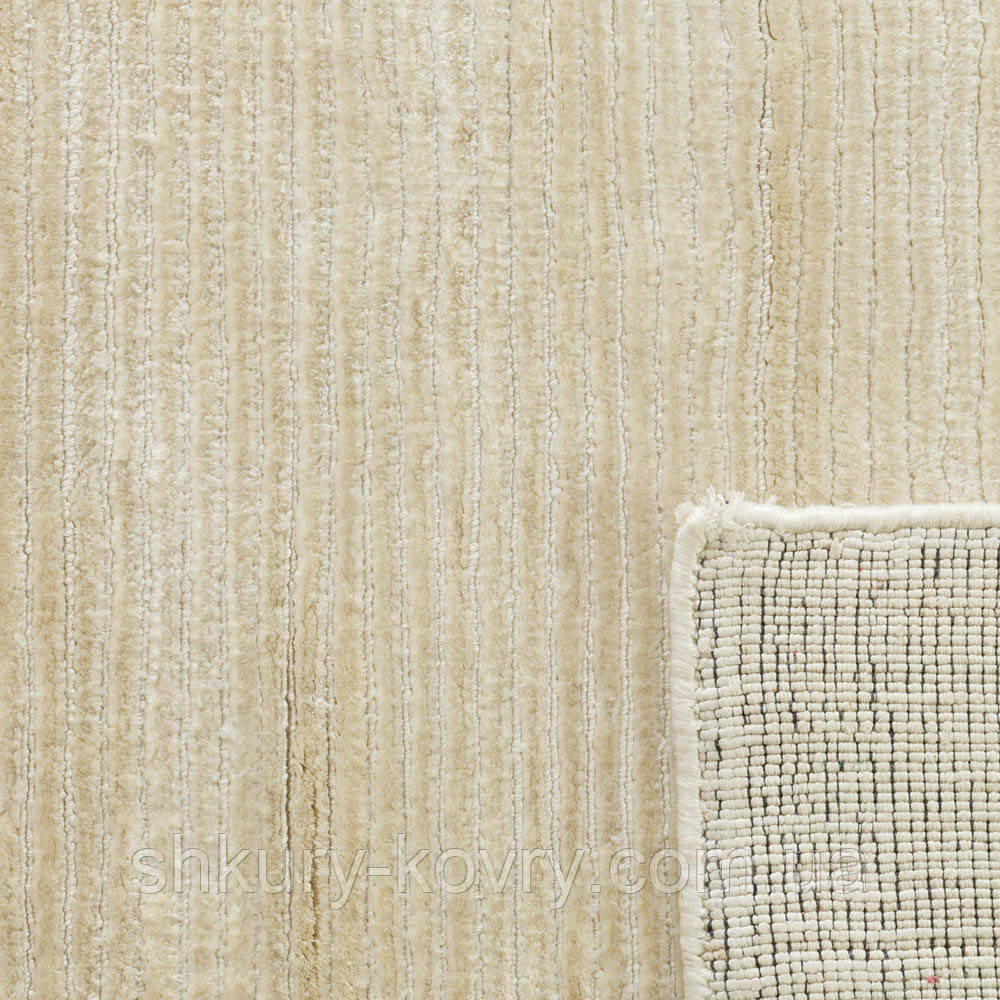 Кремовий килим із шовку однотонний із текстурою в смужку та кантом