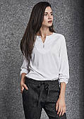 Жіноча блуза білого кольору з довгим рукавом. Модель 260074 Enny, Польща