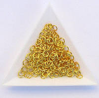 З'єднувальні кільця діаметр 5 мм товщина 0,7 мм золото (приблизно 0,5 кг)