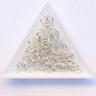 З'єднувальні кільця діаметр 7 мм товщина 0,7 мм св. срібло (приблизно 0,5 кг)