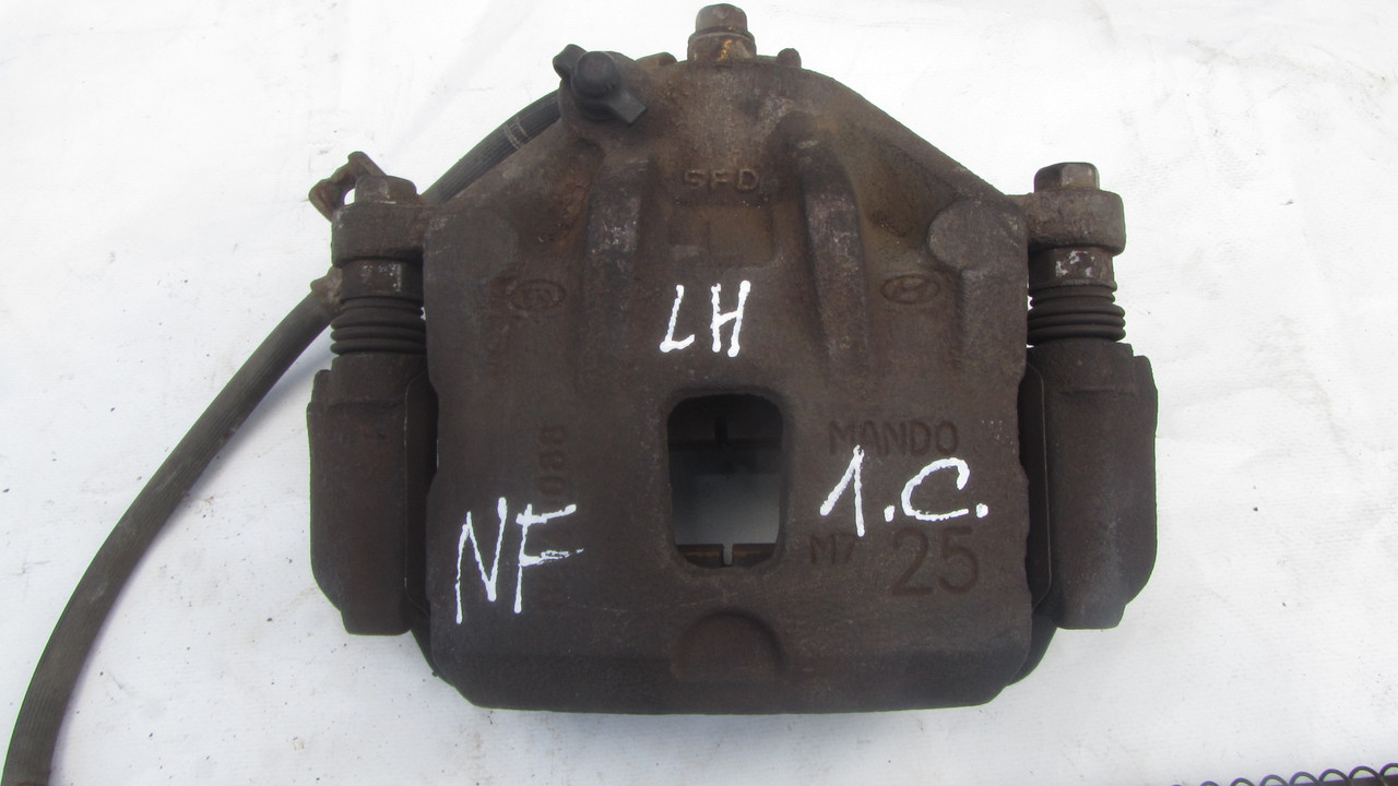 Суппорт гальмівний передній лівий Hyundai Sonata NF 2005-2010 581803KA01, фото 1