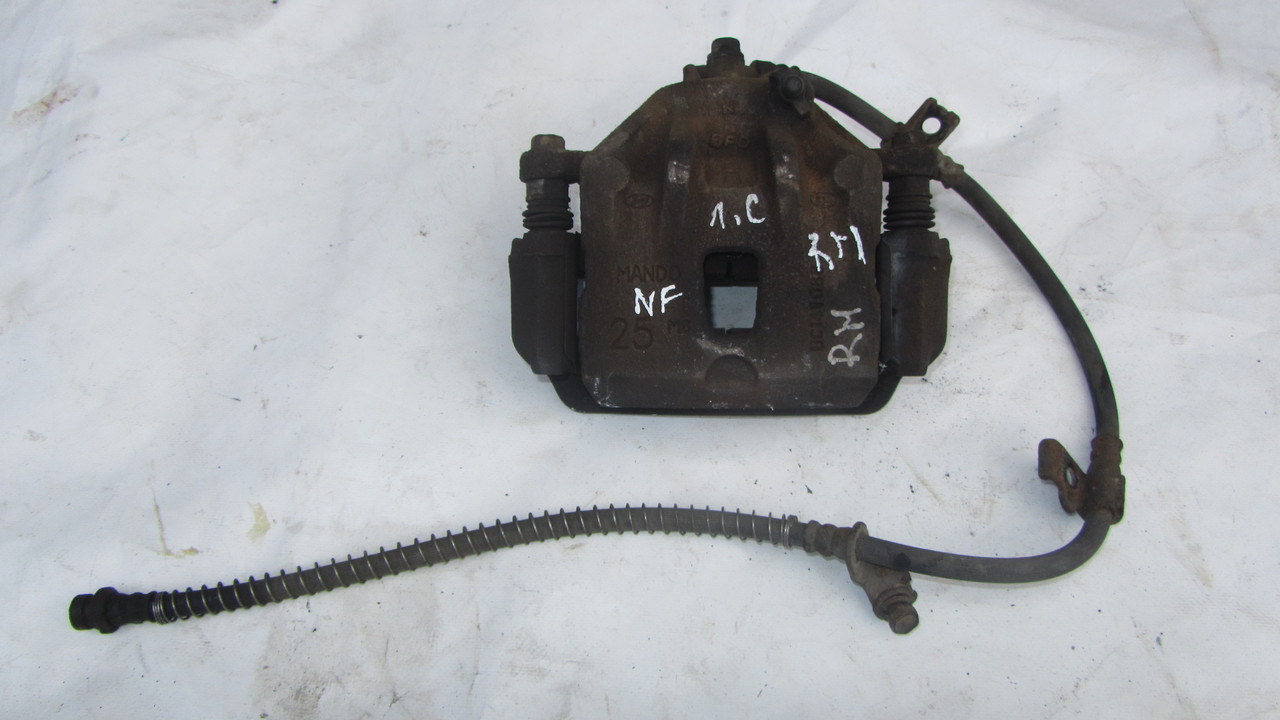 Суппорт гальмівний передній правий Hyundai Sonata NF 2005-2010, фото 1