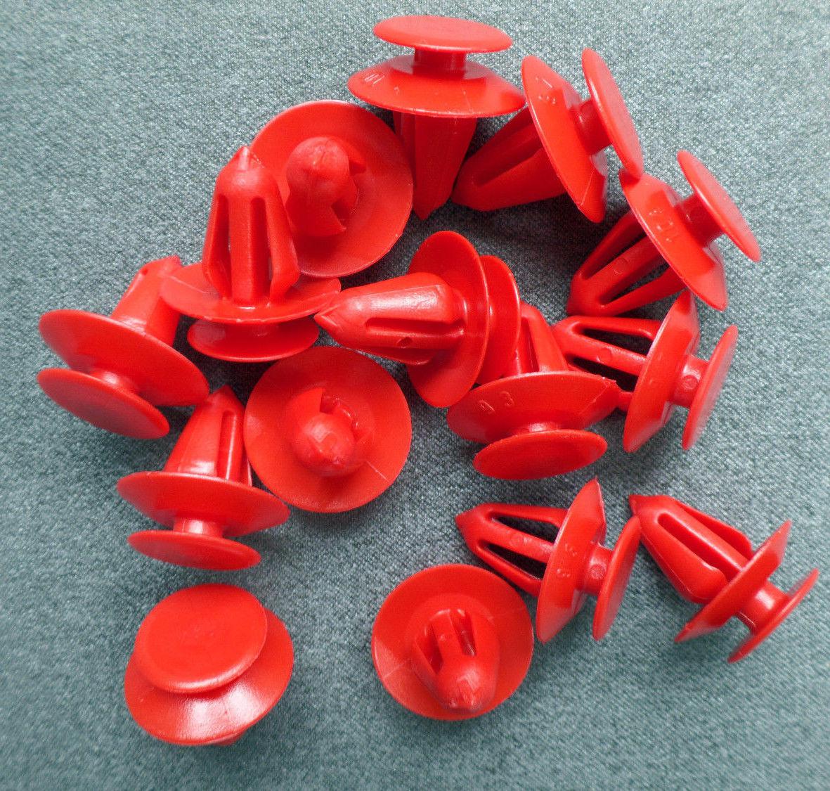 Затискач (пістон, клямка, кріплення) оббивки (обшивки) дверей салону (d=13 mm) червона (червоний) GM 2345959 90457