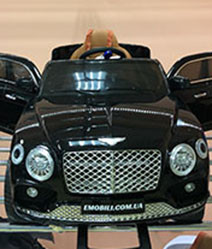 Дитячий кросовер Bentley Bentayga пульт блютуз, АКБ 12V 7AH, амортизатори, двері відчиняються, ручка, коліщатка