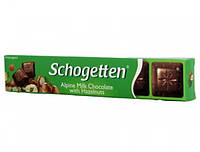 Шоколад Schogetten Alpine Milk with Hazelnuts - Молочный шоколад с кусочками лесного ореха