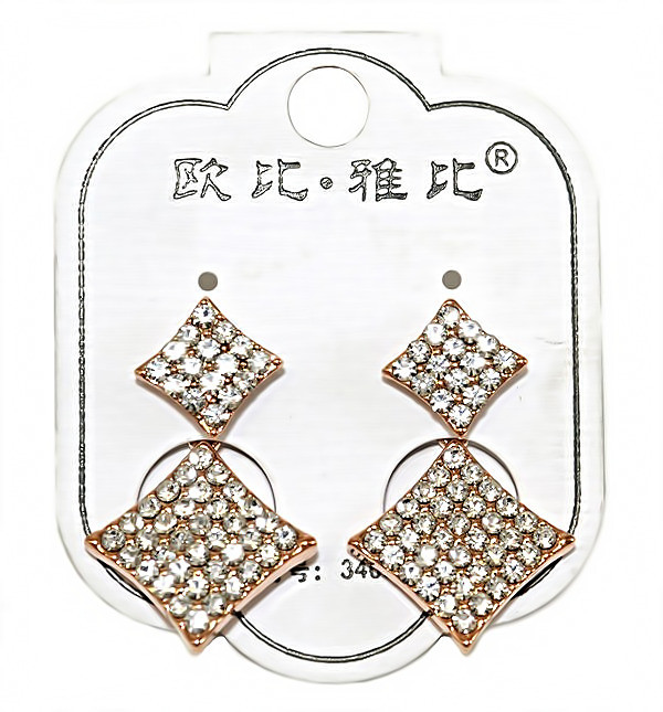 Сережки гвоздики. Камені: білий циркон. Колір оправи: позолота. Висота сережки: 2,5 см. Ширина: 1,5 см.