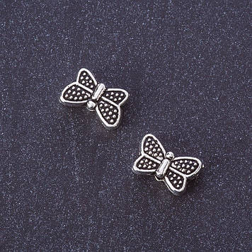 Фурнітура намистина вставка Метелик колір металу "срібло" d 10х7мм фас. 20 гр. + -29шт.