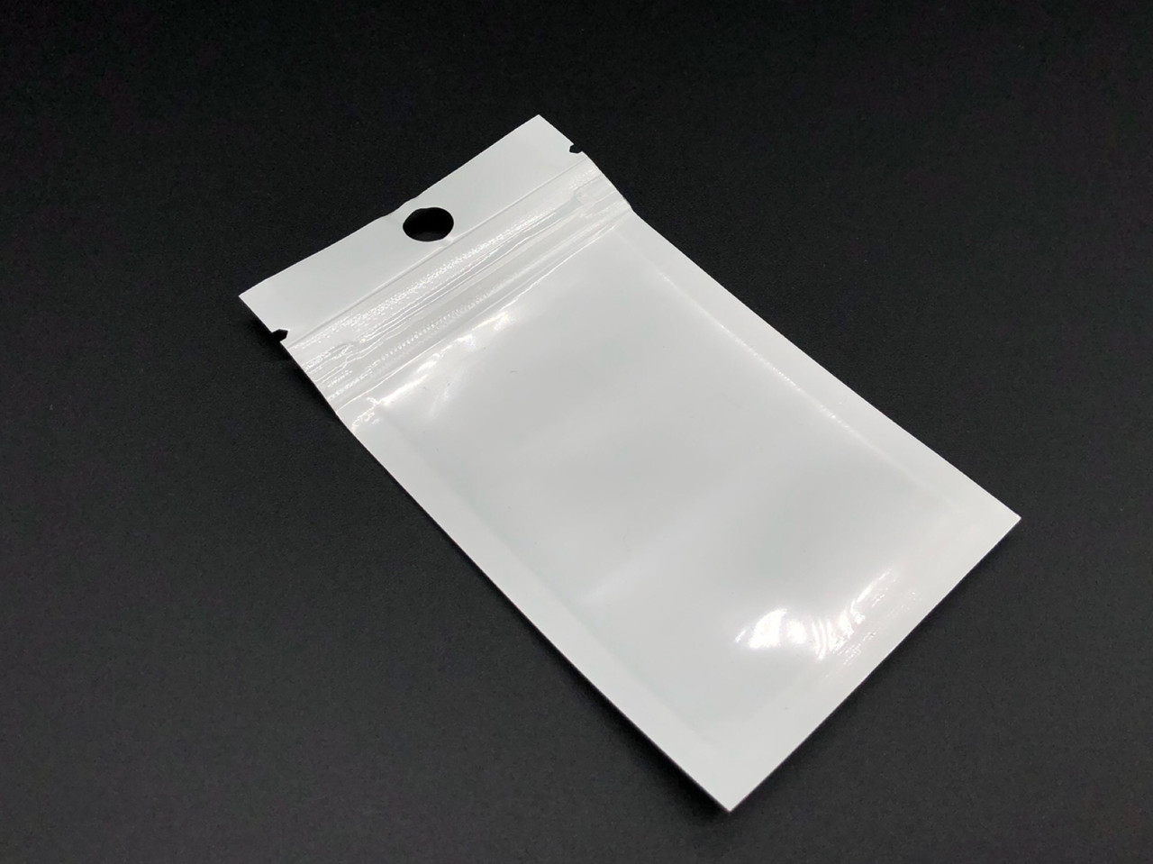 Зіп-Лок пакет із ZIP-замком і підвісом Поліпропіленовий 6х10 см. 100шт/уп. біло-прозорі Європакети Струна, фото 1