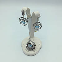 Комплект Серебряные серьги и кольцо голубой топаз фианит.