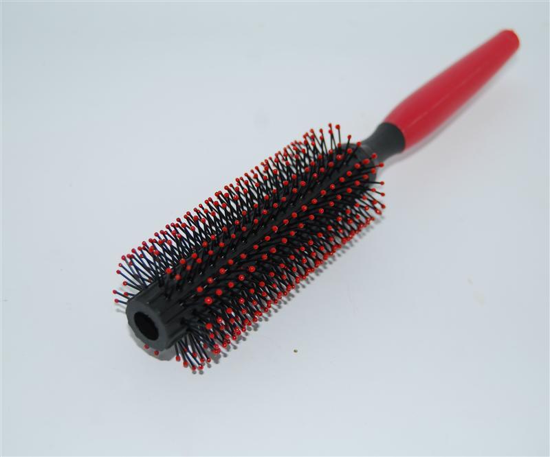 Гребінець із червоною ручкою 008