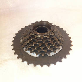 Зірочка на велосипед задня. Вело трещітка 7 зірок megarange. Зірки для велосипеда. Трещітка на велосипед.