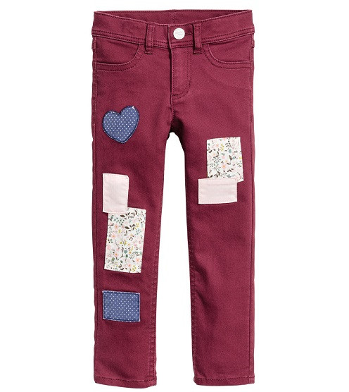 Красиві брюки з декоративними латками H&M для дівчинки.