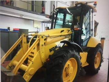 Екскаватор Komatsu WB 97 S-Baggerlader.