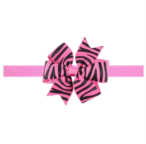 Рожева дитяча пов'язка з принтом зебри - розмір універсальний (на резинці), бантик 8см