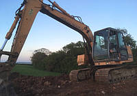 Гусеничний екскаватор Case 588