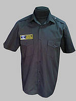 Чорна сорочка з коротким рукавом з двома кішенями з клапаном , пагони