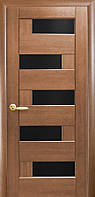 Межкомнатные двери Новый стиль Пиана blk с чёрным стеклом золотая ольха ПВХ Deluxe 400