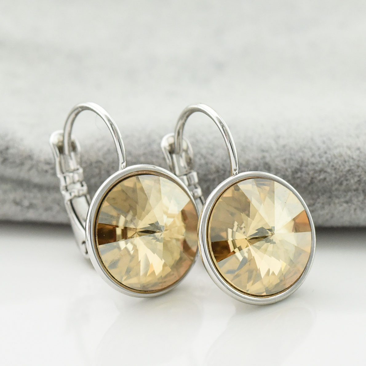 Сережки з кристалами Swarovski 21403 розмір 20х12 мм колір золота тінь позолота Біле Золото