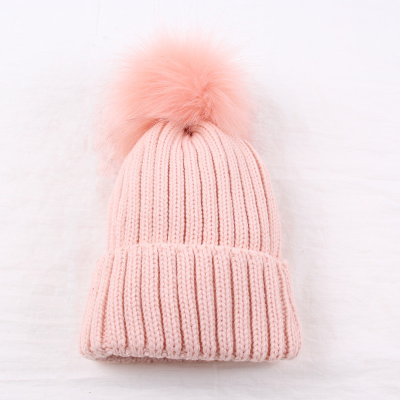 Жіноча зимова шапка з великим помпоном однотонна рожева опт