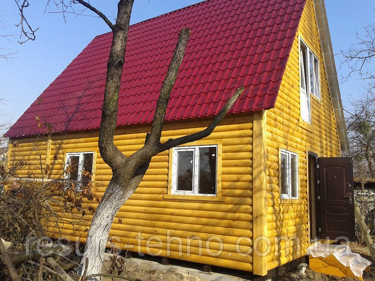 Будинок дерев'яний,каркасний 8 м х 6 м із блокхауса з мансардою