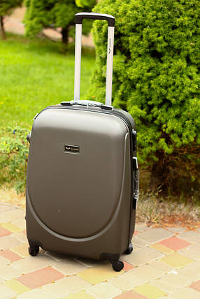 Недорогий пластиковий чемодан середній на 4-х колесах графіт Польща / пластикова Валіза середня сіра, фото 2