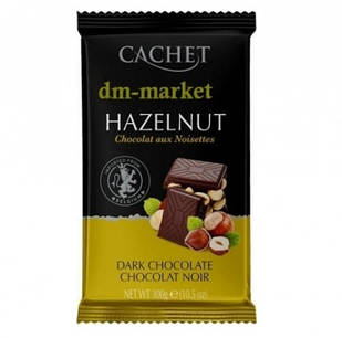 Бельгійський чорний шоколад Cachet Hazelnut, 300 г з цільним горіхом фундук