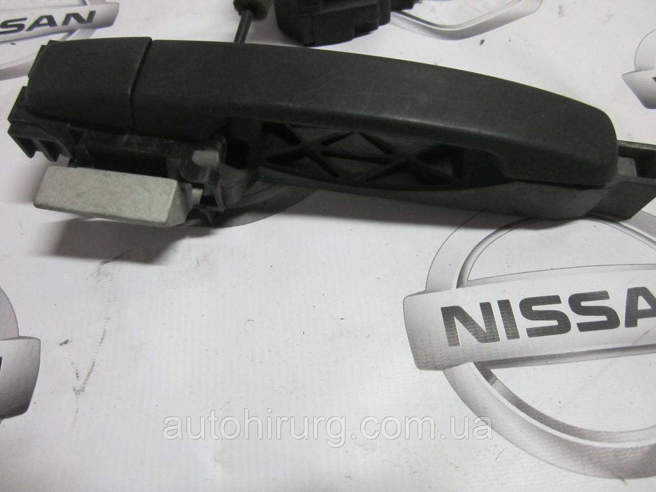 Передня ліва дверна ручка Nissan Navara D40 (80611 EB300)