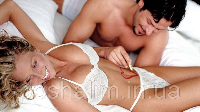 Фото Жінка і чоловік в ліжку, пристрасть